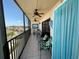 Relaxing balcony with comfortable seating and a beautiful community view at 25188 Marion Ave # F307, Punta Gorda, FL 33950