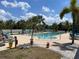 Enjoy a refreshing dip in this community pool surrounded by lush landscaping, plus plenty of lounge seating at 25188 Marion Ave # F307, Punta Gorda, FL 33950