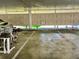 Garage parking with marked spaces and bike racks at 25188 Marion Ave # F307, Punta Gorda, FL 33950