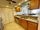 Kitchen with stone countertops, cabinetry and stainless steel appliances at 25188 Marion Ave # F307, Punta Gorda, FL 33950