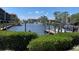 Scenic water view featuring boat docks and lush landscaping, creating a serene and inviting atmosphere at 25188 Marion Ave # F307, Punta Gorda, FL 33950