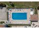 Overhead shot highlighting community pool with surrounding lounging area at 26396 Nadir Rd # 507, Punta Gorda, FL 33983