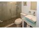 Modern bathroom with a glass-enclosed shower, vessel sink, and stylish vanity at 4158 Tamiami Trl # G1, Port Charlotte, FL 33952