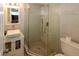 Contemporary bathroom showcasing a walk-in shower, a modern vanity, and clean, bright lighting at 4158 Tamiami Trl # G1, Port Charlotte, FL 33952