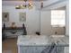 Bright dining area visible from the kitchen, enhanced by a decorative light fixture at 4158 Tamiami Trl # G1, Port Charlotte, FL 33952