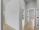Hallway offering views into multiple rooms at 4425 Lagoon Ter, North Port, FL 34286