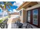 Inviting balcony with seating, showcasing water views and beautiful architectural details at 48 Colony Point Dr, Punta Gorda, FL 33950