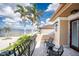 This home features a beautiful tiled balcony overlooking the street and ocean, perfect for relaxing outdoors at 48 Colony Point Dr, Punta Gorda, FL 33950