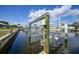 Private boat lift on canal, offering convenient access to the water for boating and waterfront activities at 530 Matares Dr, Punta Gorda, FL 33950