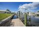 Waterfront property featuring a private dock and boat lift along a canal with easy access to the open water at 530 Matares Dr, Punta Gorda, FL 33950