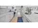 Modern kitchen with white cabinetry, granite countertops, stainless steel appliances, and ample counter space at 530 Matares Dr, Punta Gorda, FL 33950