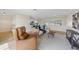 Spacious living room transitions into the kitchen and has views to the outdoor pool at 530 Matares Dr, Punta Gorda, FL 33950