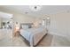 Bright main bedroom with a king bed and marble floors throughout at 530 Matares Dr, Punta Gorda, FL 33950