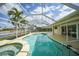Screened-in pool area and canal views at 530 Matares Dr, Punta Gorda, FL 33950