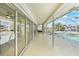 Screened-in pool area and seating with views of the canal at 530 Matares Dr, Punta Gorda, FL 33950