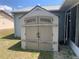 View of an outdoor storage shed in the backyard of the property at 6728 Thorman Rd, Port Charlotte, FL 33981
