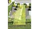 Aerial view of a well manicured lot with partial views of surrounding homes in the community at 7209 W Lenox Cir, Punta Gorda, FL 33950