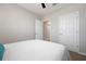 Spacious bedroom with multiple doors and access points for convenience at 7209 W Lenox Cir, Punta Gorda, FL 33950