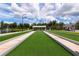 Well-maintained bocce ball courts with lush green surroundings, providing a relaxing recreational space at 7209 W Lenox Cir, Punta Gorda, FL 33950