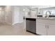 Modern kitchen features a breakfast bar, stainless steel appliances, and an open concept at 7209 W Lenox Cir, Punta Gorda, FL 33950
