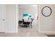 Home office features neutral walls, carpet, and modern desk setup at 7209 W Lenox Cir, Punta Gorda, FL 33950