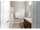 Bright bathroom featuring a shower-tub combination and dark wood vanity at 8725 Amaretto Ave, Sarasota, FL 34238