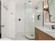 Modern bathroom featuring a glass-enclosed shower, and a stylish vanity at 114 Mcgregor St, Punta Gorda, FL 33950