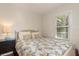 Cozy bedroom featuring a comfortable bed, soft lighting, and a peaceful ambiance for relaxation at 114 Mcgregor St, Punta Gorda, FL 33950