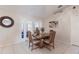 Dining room with French doors, neutral walls, tile floors, and views to the Gathering room at 1381 Fargo St, Port Charlotte, FL 33952