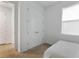 Bedroom featuring a large closet with mirrored doors and a cozy atmosphere at 15975 Mulrion Blvd, Punta Gorda, FL 33982