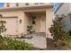 Charming front porch with a well-maintained walkway and flower beds at 15975 Mulrion Blvd, Punta Gorda, FL 33982