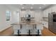 Spacious kitchen with a large island, granite countertops, and ample storage space at 15975 Mulrion Blvd, Punta Gorda, FL 33982
