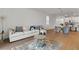 Living room with stylish sofa, mirrored coffee table, and open layout at 15975 Mulrion Blvd, Punta Gorda, FL 33982