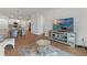 Living room showcasing an open floor plan with access to kitchen and dining areas at 15975 Mulrion Blvd, Punta Gorda, FL 33982