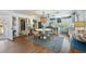 Open-concept kitchen and dining area with an island, stainless appliances, and stylish decor at 17506 Cape Horn Blvd, Punta Gorda, FL 33955