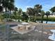 Backyard view with water access and decorative patio at 21215 Cottonwood Ave, Port Charlotte, FL 33952