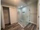 Modern bathroom with a frameless glass shower, stylish tile and neutral paint at 21215 Cottonwood Ave, Port Charlotte, FL 33952