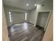 Bedroom with natural light and modern ceiling fan, spacious closet and neutral paint at 21215 Cottonwood Ave, Port Charlotte, FL 33952