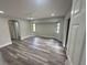 Bright bedroom featuring plenty of natural light, modern ceiling fan, and neutral paint at 21215 Cottonwood Ave, Port Charlotte, FL 33952