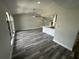 Spacious living room featuring modern flooring and plenty of natural light at 21215 Cottonwood Ave, Port Charlotte, FL 33952