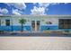 Building detail showing a unique, painted mural, and access to the outdoors at 25225 Rampart Blvd # 1607, Punta Gorda, FL 33983