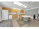 Kitchen area with appliances, neutral decor, and plenty of counter space at 25225 Rampart Blvd # 1607, Punta Gorda, FL 33983