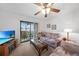 Inviting living room with a sliding glass door that opens to a balcony, providing plenty of natural light at 25225 Rampart Blvd # 1607, Punta Gorda, FL 33983