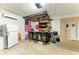 This finished garage boasts a custom bar, providing an ideal entertaining space with style and functionality at 2636 Mauritania Rd, Punta Gorda, FL 33983