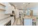 Spacious kitchen featuring granite countertops, stainless steel appliances and a center island with seating at 2636 Mauritania Rd, Punta Gorda, FL 33983