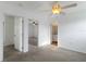 Bedroom featuring two doorways and neutral carpeting at 2776 Tusket Ave, North Port, FL 34286