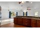 Gourmet kitchen with granite countertops, stainless appliances, and a gas cooktop on island at 2776 Tusket Ave, North Port, FL 34286