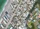 Stunning aerial view showcasing waterfront homes with boat docks and beach access, ideal for coastal living at 2779 N Beach Rd # A, Englewood, FL 34223