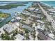 Amazing aerial view featuring a waterfront neighborhood with tropical landscaping and easy beach access at 2779 N Beach Rd # A, Englewood, FL 34223