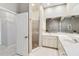 Bright bathroom featuring a walk-in shower and well lit vanity area at 2779 N Beach Rd # A, Englewood, FL 34223